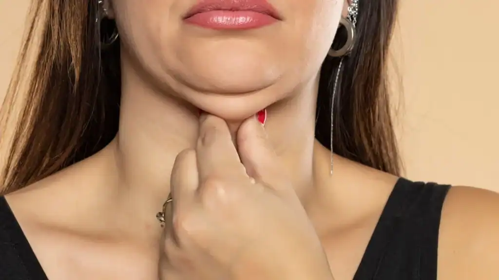 An image of a woman with double chin, sad, worried : Non Surgical Double Chin Removal Treatment in Isle of Isla, UK